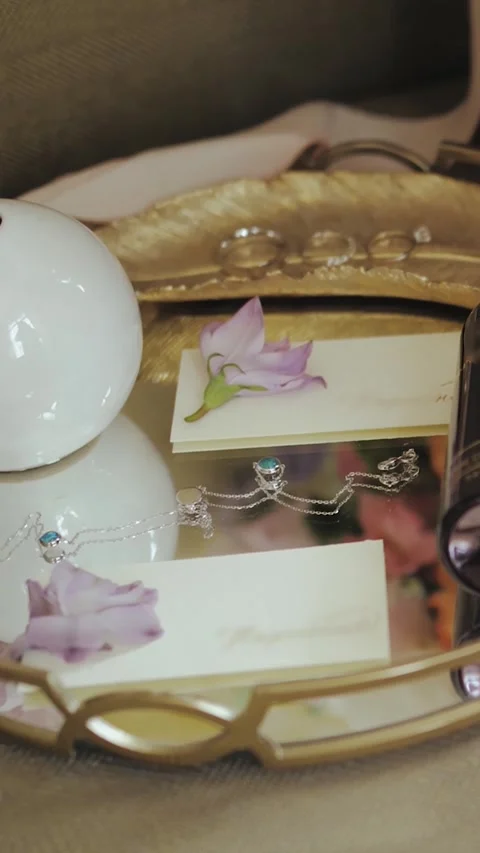 Vertical screen: Wedding Invitation Setup featuring Beautiful Floral Accents and Stock Footage 307924551