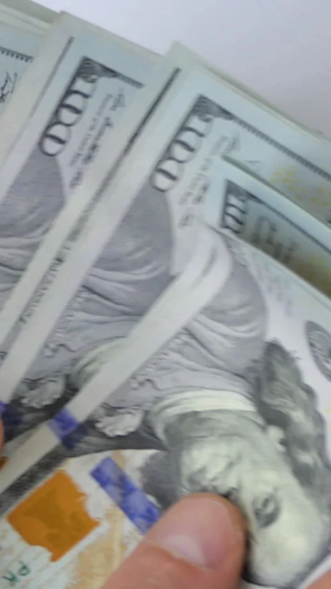 Vertical Screen: World economic crisis. A woman counts money. Bribe. Dirty money Stock Footage 232265219