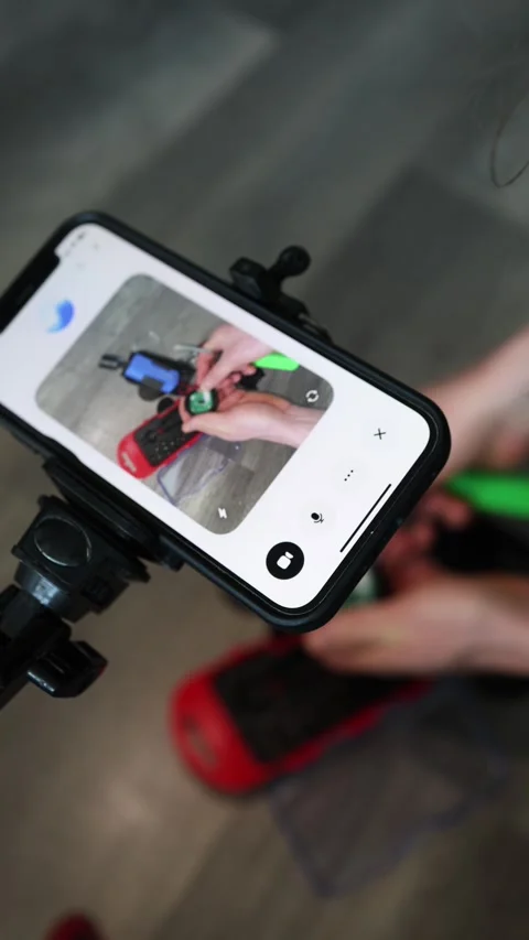 Vertical screens make remote help easier — real-time video allows experts to gui Stock Footage 307340966