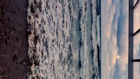 Vertical, Sea Foaming Waves Falling On Shore Black Sand Beach Beautiful Black Gr Stock Footage 320941897