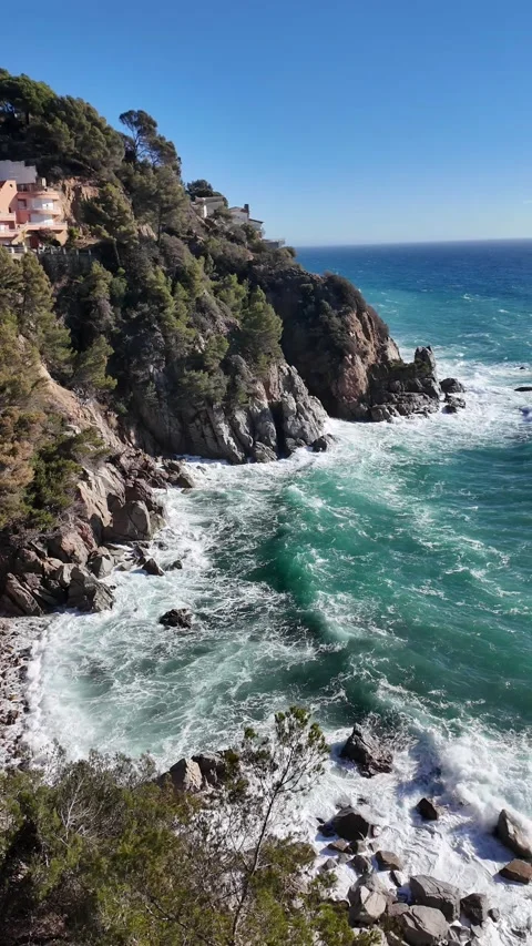 Vertical sea view from above with mountain and villas on the background Stock Footage 270734282