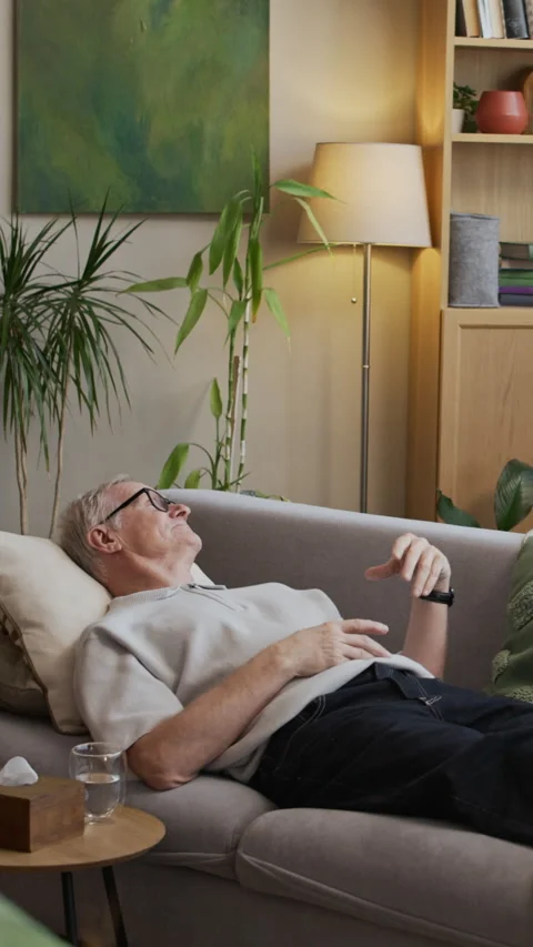 Vertical of Senior Patient Sharing Problems Lying on Couch in Therapist Office Stock Footage 330665929