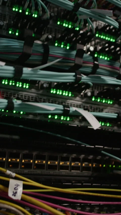 Vertical of Server Rack Filled with Fiber Patch Cables in Data Center Stock Footage 330541929