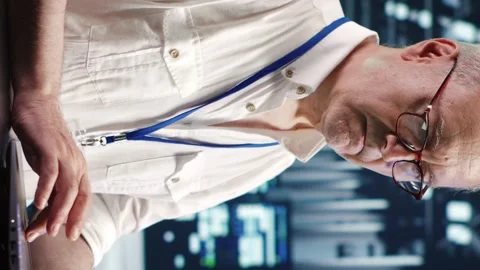Vertical Serviceman optimizing data center Stock Footage 247741628