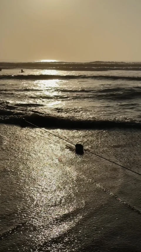 Vertical Shallow Ocean Shore with Safety Buoy stretched on a rope at Golden Vidéo 342472001
