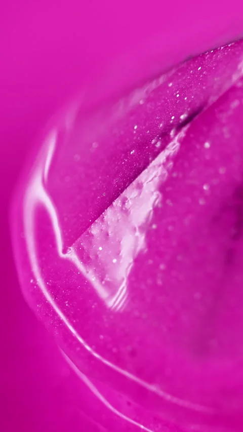 Vertical shimmering crystal glitter ink blur pink Stock Footage 284901204