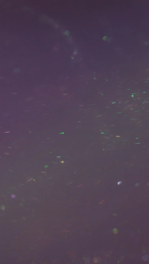 Vertical shimmering flow defocused glitter ink Stockbeeldmateriaal 339771035