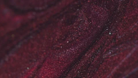 Vertical shimmering fluid background flow burgundy polish Stock Footage 273436619