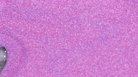 Vertical shimmering fluid background pink silver surface Video stock 272320829