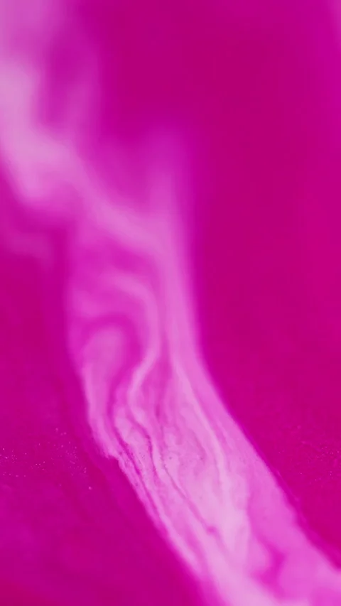 Vertical shimmering paint ink flow pink white mix Stock Footage 284292747