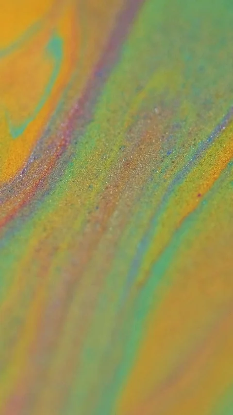 Vertical shiny paint spill orange purple sand mix Stock Footage 296207119