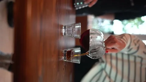 Vertical Shoot : Hot Black Coffee Was Poured Into Glasses In Coffee WorkShop Video stock 196197157