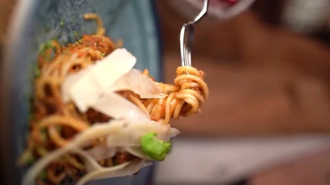 Vertical Shoot : Putting Parmesan Cheese On Spaghetti Shooting. Video stock 196200178