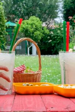 A vertical shoot of two lemon slush with some snaks Stock Photos