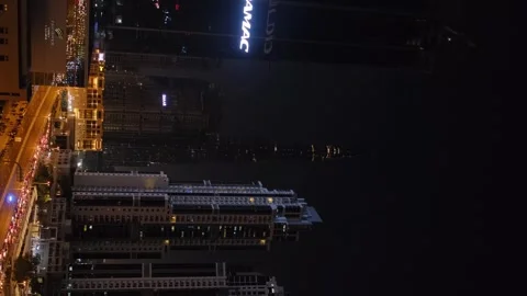 Vertical shooting of the Dubai skyscraper during the New Year's fireworks Stock Footage 246400019