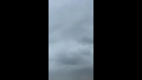 Vertical shooting Time Lapse of Panoramic view of dramatic gray storm clouds Stock-Footage 346176239