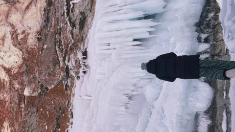 Vertical shooting. winter Baikal, ice on the rocks Stock Footage 270828592