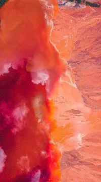 Vertical shot of an abstract background with pink colored wavy patterns Stock Photos
