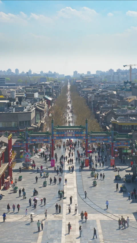 Vertical Shot: Aerial View of Bustling Qianmen Pedestrian Street, Beijing Stock Footage 332048644