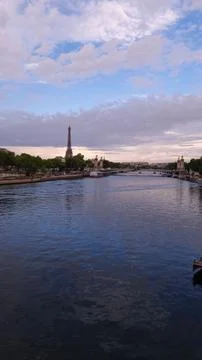 Vertical shot of the beautiful Eiffel Tower at a soft sunset in Paris, France Stock Photos