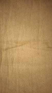 Vertical shot of a beige decorative plaster wall texture. Fotos Stock