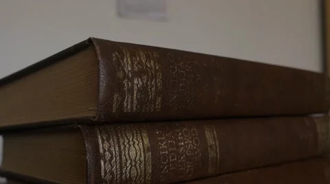 Vertical Shot Of Books - Encyclopedia - Old Books Stock Footage 49043893