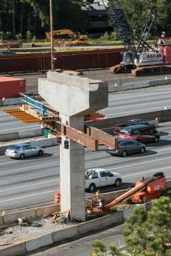Vertical Shot Of Bridge Overpass Being Constructed In Metro Atlanta Stock Photos