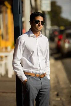 Vertical shot of businessman and developer Rush Bhana posing outdoors Foto stock