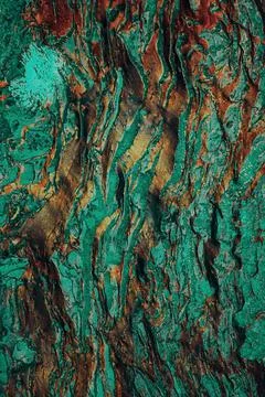 Vertical shot of a colorful bumpy rough wall texture Stock Photos