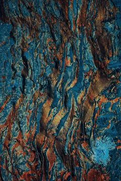 Vertical shot of a colorful bumpy rough wall texture 스톡 사진