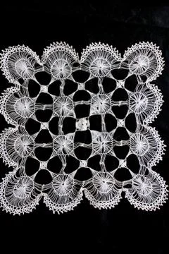 Vertical shot of crafts in white thread on an isolated background 写真素材