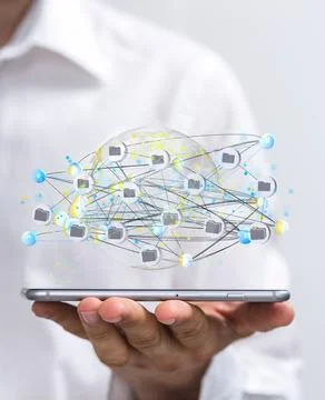 Vertical shot of a data cloud storage network above a smartphone Stock Photos