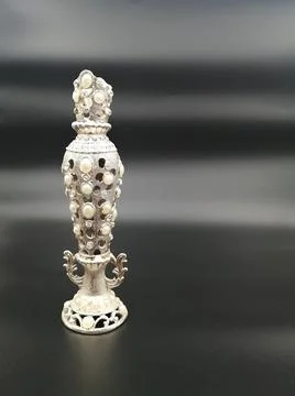 Vertical shot of decorative chess king figurine isolated on black background Stock Photos