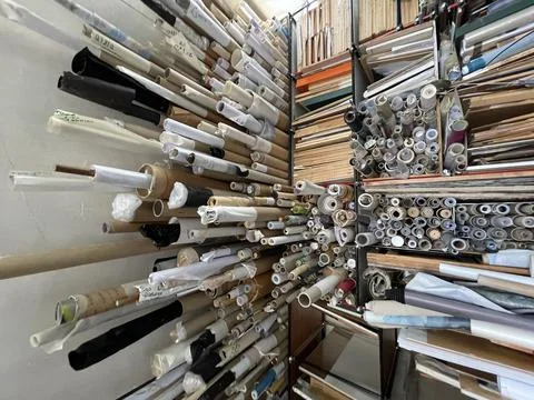 Vertical shot of different papers and tools of an artist workspace in Paris, 스톡 사진