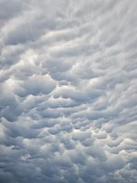 Vertical shot of a dramatic cloudy sky perfect for mobile wallpapers and so.. Stock Photos