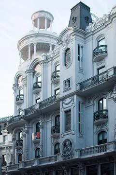 Vertical shot of Edificio Grassy building on Gran via street. Madrid, Spain. Stock Photos