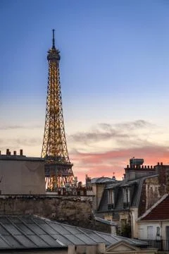 Vertical shot of the Eiffel Tower during a pink sunset in Paris, France Stock Photos