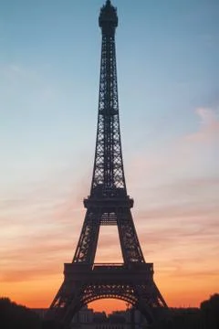Vertical shot of Eiffel Tower Paris France with sunset background Stock Photos