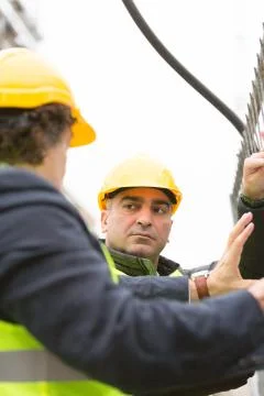 Vertical shot of engineer and architect with hardhat Stock Photos