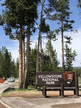 Vertical Shot of Entryway to Yellowstone National Park with Road Closed Sign Stock Photos