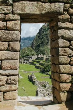 Vertical shot of the famous Machu Pichu ruins in Peru Stock Photos