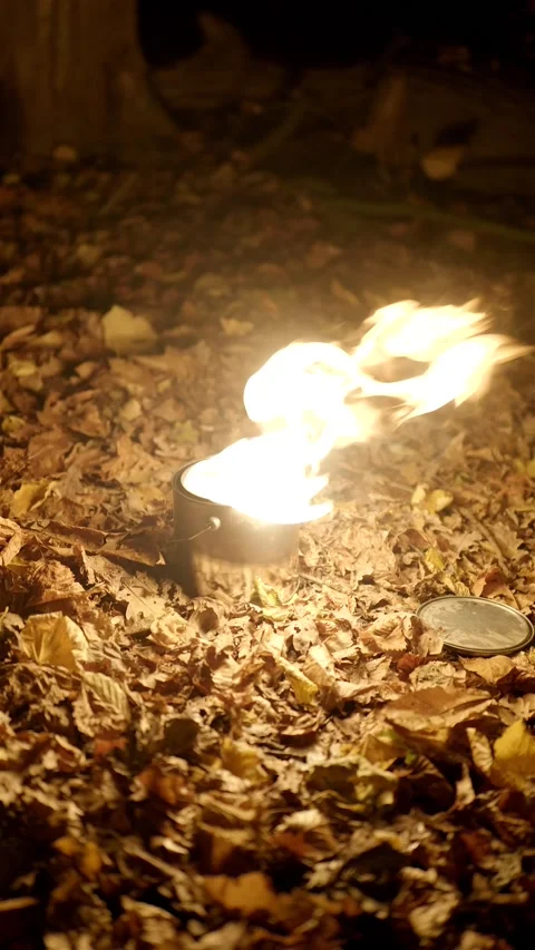 Vertical shot of fire buckets with candles in garden at wedding Stockbeeldmateriaal 223889402