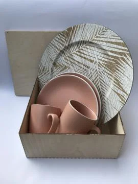Vertical shot of a gift dining set in the box Stock Photos