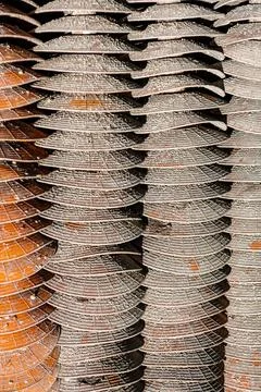 Vertical shot of high row lines of Clay Roof Tiles Storage with pattern Stock Photos