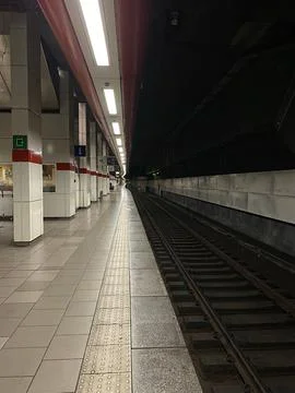 Vertical shot inside an empty subway station Stock Photos