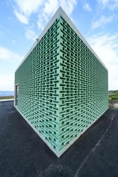 Vertical shot of an interesting modern angular public restroom building in Norwa Stock Photos