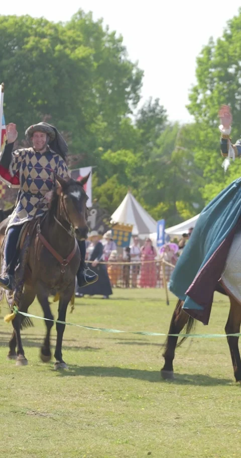 Vertical Shot of the Lady of the Joust Leading a Medieval Horse Parade Stock Footage 340264961