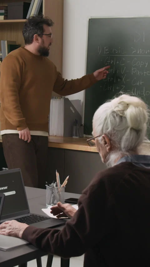 Vertical Shot of Lecture on Computer Literacy for Seniors Stock Footage 333709993