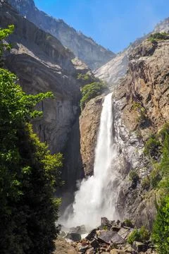 Vertical shot of Lower Yosemite Fall on a beautiful sunny summer day, Epic Stock Photos