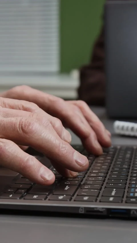 Vertical Shot of Male Hands Typing on Keyboard in Computer Class Stock Footage 333708482